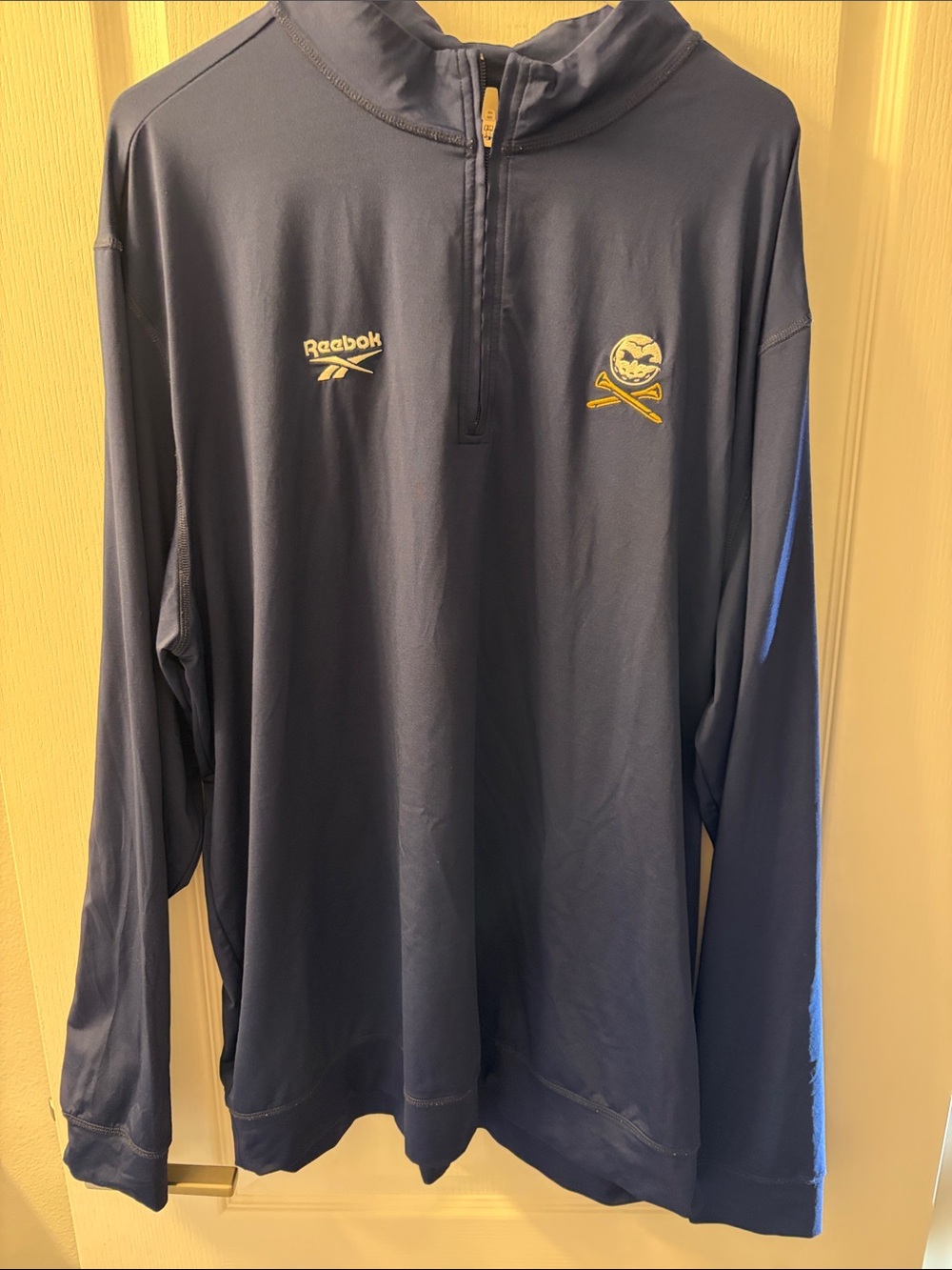 Reebok Navy Quarter-Zip Pullover with Crushers Logo. Bryson DeChambeau.